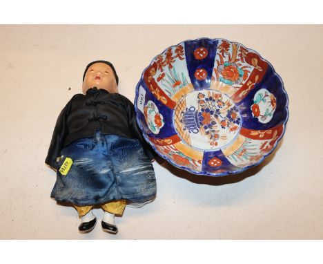 A Japanese Imari bowl and a vintage Oriental doll Micale of Hong Kong "Di-Di"
