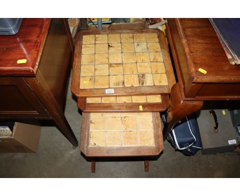 A nest of three G-plan tile topped occasional tables 