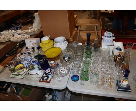 A collection of decorative glass and china including candlesticks, drinking glasses, vases, Danish Dansk design cooking dish 