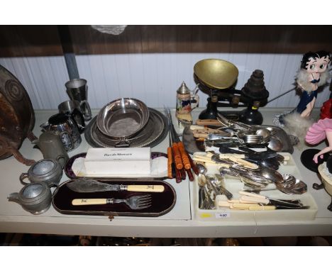 A quantity of various plated and other cutlery, a set of cast iron kitchen scales, fish servers, pewter ware etc.