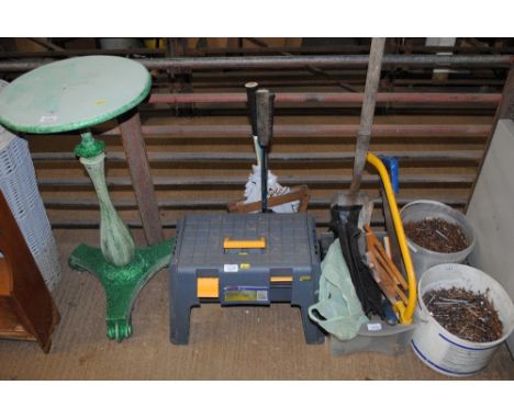 A storage stool and contents, a quantity of vintage badminton racquets