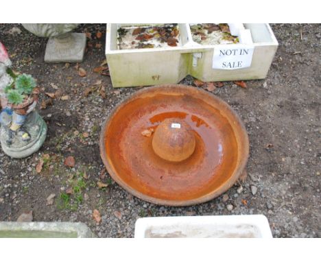 A cast iron pig trough 