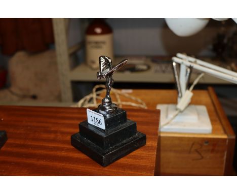 A Spirit of Ecstasy style car mascot raised on step base (14)