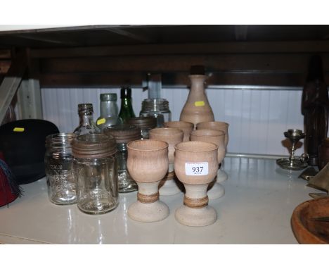 A Studio Pottery carafe and six goblets, Kilner jars, old bottles etc.