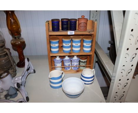 A pine spice rack and quantity of various spice jars to include T G Green, Henry Watson, Spode etc., two T G Green jugs and a