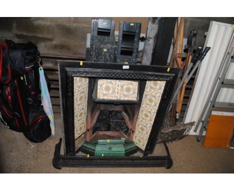 A marble fireplace with cast iron insert, tiles AF