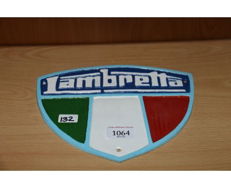 A reproduction cast iron Lambretta shield shaped plaque (132)