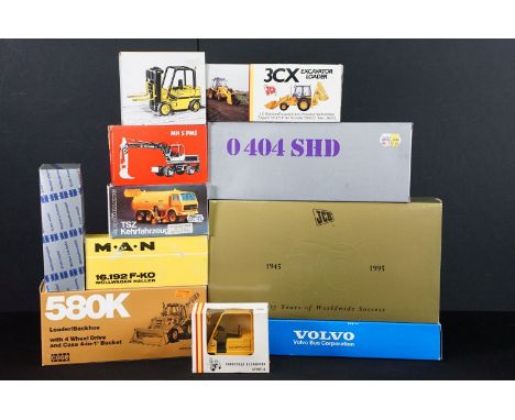 Nine boxed commercial diecast models to include Conrad Dresser-Mobil-Bagger No. 2818, NZG Modelle 309 CAT V50 D, J I Case 580