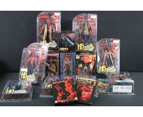 Collection Of Hellboy figures and collectibles featuring 8 x Mezco figures (variations of Hellboy), 3 x dvds (Hellboy II, Hel