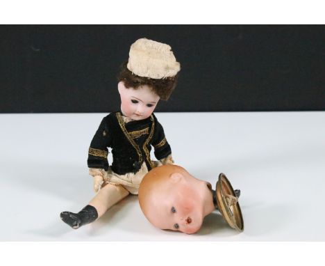 Miniature Late 19th Century / Early 20th Century French SFBJ Bebe bisque headed doll, marked to neck '26 France SFBJ 60 Paris