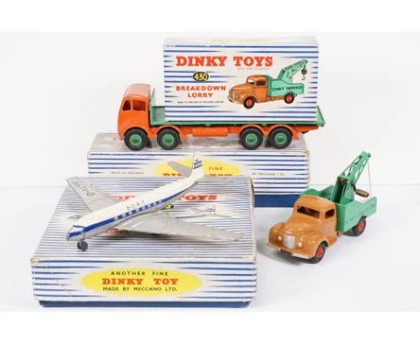 Three boxed Dinky diecast models to include 430 Breakdown Lorry, 702 DH Comet Airliner and 902 Foden Flat Truck in orange cab
