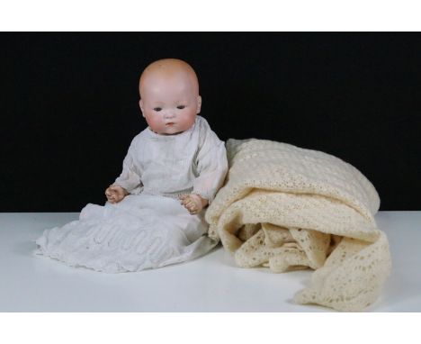 German Armand Marseille bisque headed baby doll, with blue sleeping eyes, painted facial features, marked to neck 'Germany 34