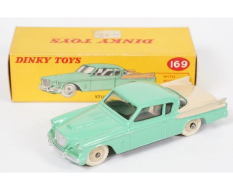 Boxed Dinky 169 Studebaker Golden Hawk in light green with beige rear, side flashes and hubs, white tires, diecast ex, box ex