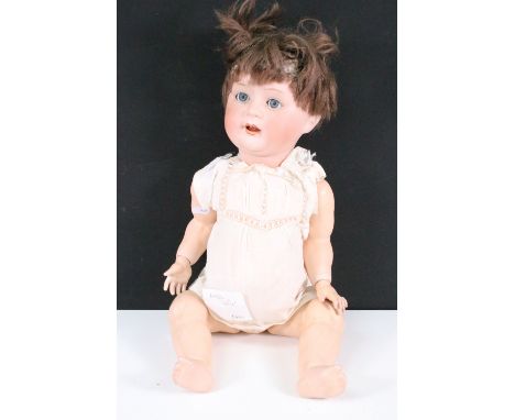 Early 20th Century German Cuno and Otto Dressel Jutta Baby bisque headed doll, marked to neck 'Jutta Baby Dressel Germany 192