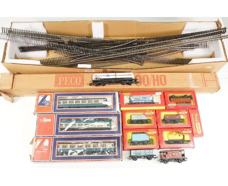 10 Boxed OO gauge items of rolling stock to include 7 x Hornby / Triang and 4 x Lima featuring coaches, wagons and tanker, pl