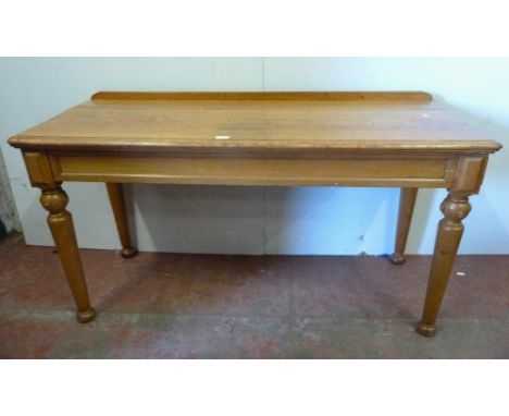 Pugin-style oak console table with rectangular top, on shaped supports, 79cm high, 143cm wide and 55cm deep. 