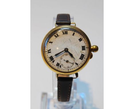 9ct gold backed wristwatch, c. 1920s, with white enamel dial, Roman numerals and seconds dial, case diameter approximately 35