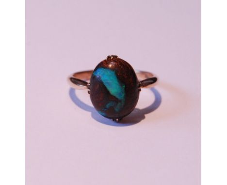 Gold ring with matrix opal cabochon, in gold, '9ct', probably 1930s, size R½, 3g gross. 