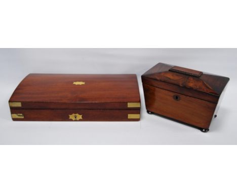 Victorian rosewood tea caddy of sarcophagus shape with twin lidded compartments, on bun feet, 11cm high, 20cm wide and 12cm d