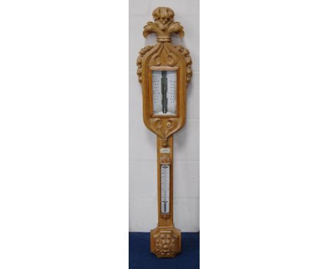 Antique carved oak stick barometer with Prince of Wales feathers surmount above acanthus appliques, mercury gauge, label for 