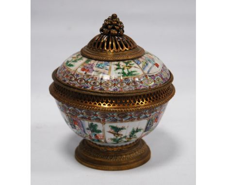 Chinese Qing Dynasty famille rose censer decorated with ormolu-type gilt metal lotus piercing to the cover and further pierci