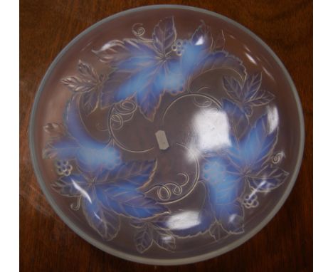 French opalescent glass bowl with applied leaf and berries to the underside, unsigned, 7.5cm high and 30cm diameter. 