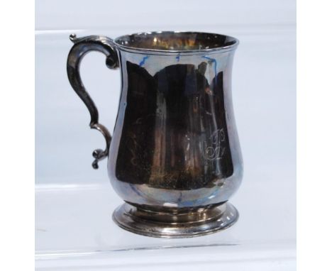 Silver pint mug of baluster shape with scroll handle, by John Kidder, 1784, 26cm, 314g. 