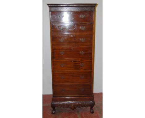 Chinese Chippendale influence mahogany tallboy-type chest of drawers, 20th century, the moulded geometric frieze above seven 
