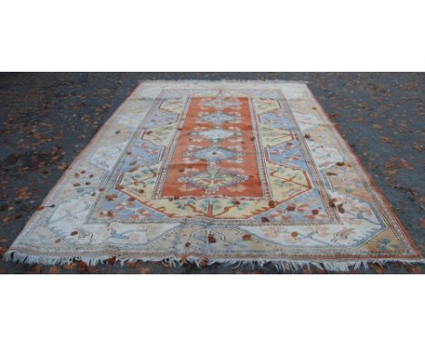 Turkish Milas hand-knotted carpet with five geometric guls to the centre flanked by further geometric motifs to the border, o