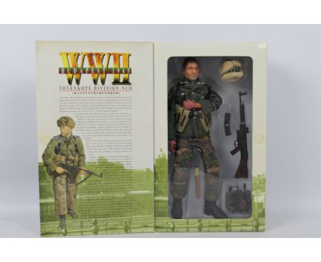 Dragon - A boxed Dragon #770015 1:6 scale WW2 Budapest 1945 "Hermann" Totenkopf Division NCO (Hauptscharfuhrer). Figure and a