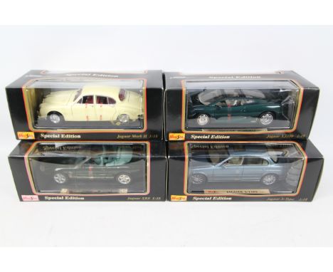 Maisto - Special Editions. 4 x 1:18 scale models appearing in Excellent condition with Excellent boxes. Jaguar XJ220 #31807, 