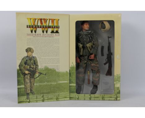 Dragon - A boxed Dragon #770015 1:6 scale WW2 Budapest 1945 "Hermann" Totenkopf Division NCO (Hauptscharfuhrer). The figure m