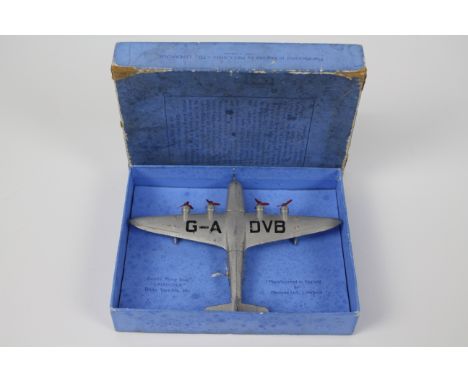 Dinky Toys - A boxed Dinky #60r Empire Flying Boat. The diecast model 'Corsair'  in silver circa 1937-40, with four 3-blade t