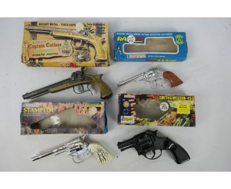 Lone Star - 4 x boxed cap guns, Captain Cutlass Buccaneer Pirate Pistol, Stampede, Ramrod and a Smith &amp; Wesson .45. The g