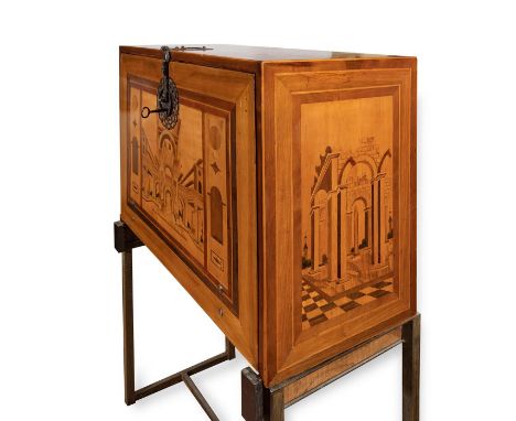 17th century German architrave.Rosewood and walnut with lemongrass and fruitwood marquetry.The chest stands on a modern iron 