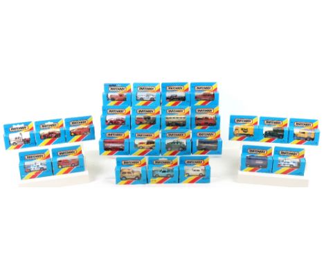 Twenty Five Blue Boxed Matchbox Superfast Models, made in Macau, including: MB1 Dodge Challenger, Toyman,MB4 57 Chevrolet, 2 