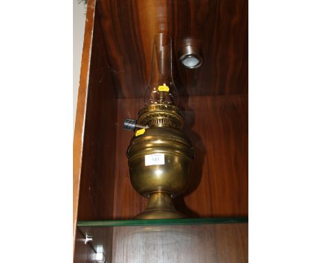 A VINTAGE OIL BURNING LAMP