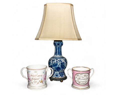 18th century, Dutch A Delft blue and white lamp together with two tankards  To be sold without reserve  Dimensions: (Lamp) 13