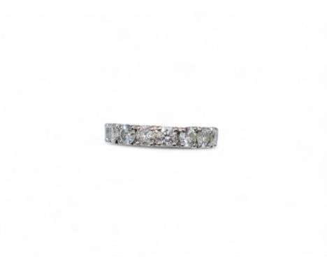 1990s A fine brilliant cut diamond and 18 k gold hoop ring. Set with sixteen brilliant cut diamonds. H-I colour, VS clarity, 