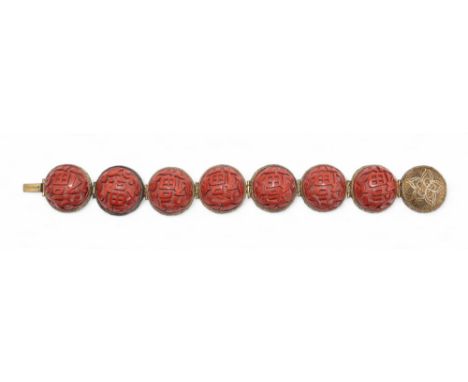 Chinese,&nbsp;late 19th century A jade, gem set and enamel silver filigree bangle and a silver gilt and filigree lacquer brac