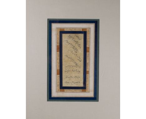 A nasta'liq calligraphic panel&nbsp; Signed by Ali Reza Dated 1019 AH / 1610 AD With a découpage calligraphic border Framed i