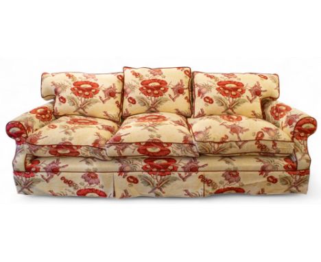 a large, Paul Frey upholstered three-seat sofa, with red piping&nbsp;  Dimensions: 30 in. (H) x 90 in. (W) x 32 in. (D)