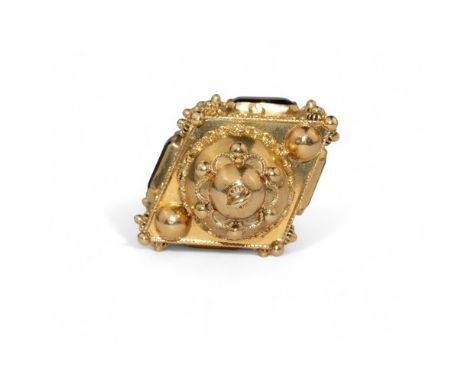 ContinentalCirca 1960An 18 carat yellow gold and filigree garnet set lantern pendantWeight: Approx. 18.01 gramsDimensions: 4 