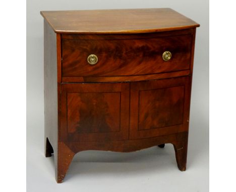 A mahogany bow front commode, 68cm high, 63.5cm wide (faults)