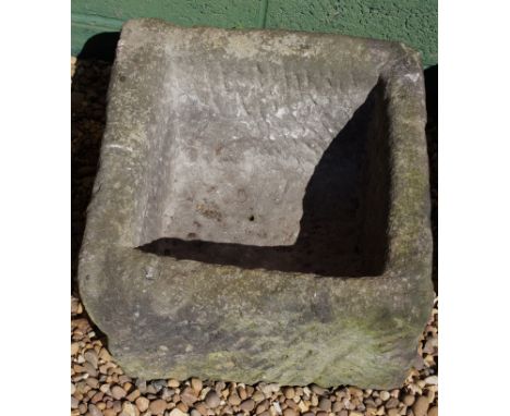 A square granite trough, 47cm wide