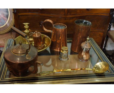 A quantity of brass and copper items including: a copper tankard; kettle; brass candle stick; ladle, etc (qty) (faults)