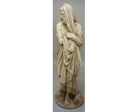 A 19th Century white marble figure emblematic of winter, the  bearded figure wrapped in a cloak, a flambeau and faggots at hi