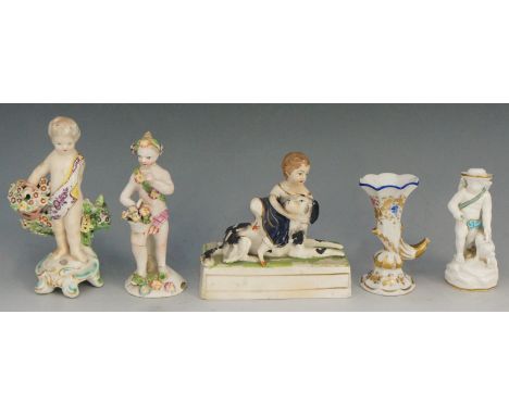 A selection of Continental porcelain figures to include: two figures of youths with baskets of flowers; a girl playing with a