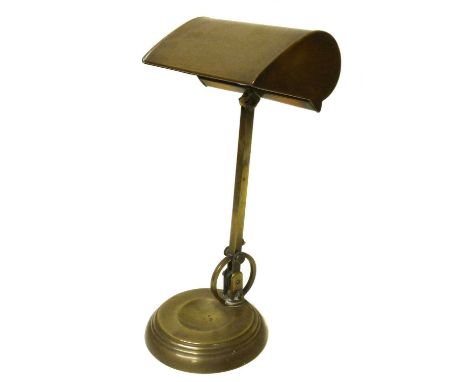 Early 20th-century brass framed desk lamp, articulated rectangular shade on a single column, marked made in England, loaded c