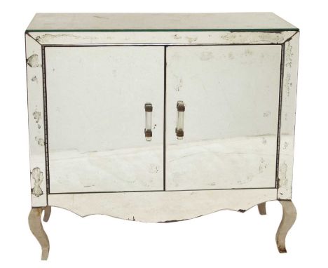 Early 20th-century continental side cabinet, veneered all over with antique mirror glass, two doors with brass fittings suppo